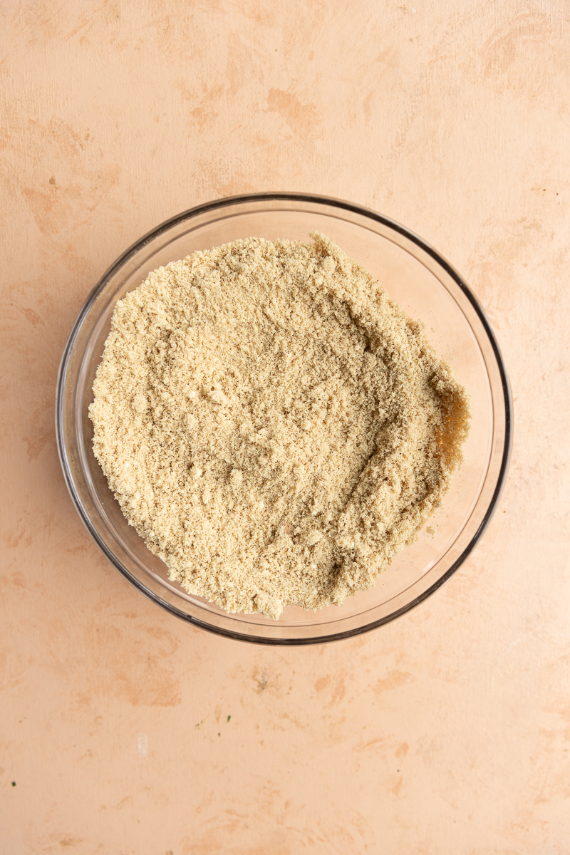 Dry ingredients in glass mixing bowl.