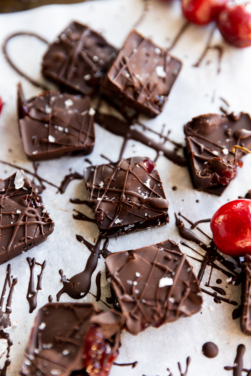 Chocolate cherry cups with flaky sea salt on top.
