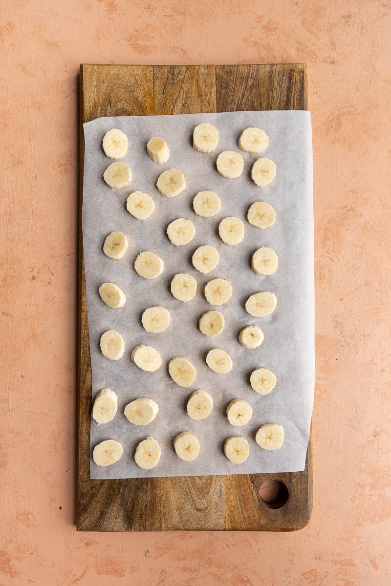 Banana disks on parchment paper.