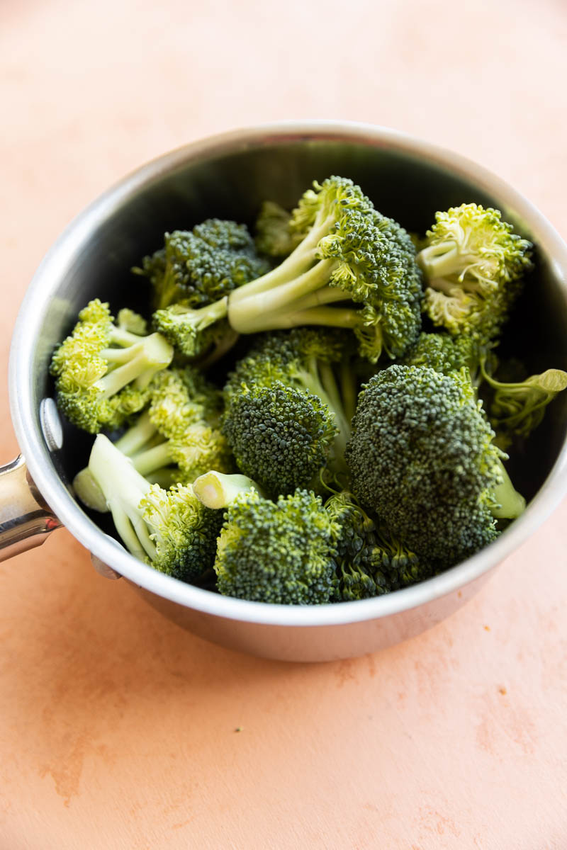 Broccoli in a small saucepan.