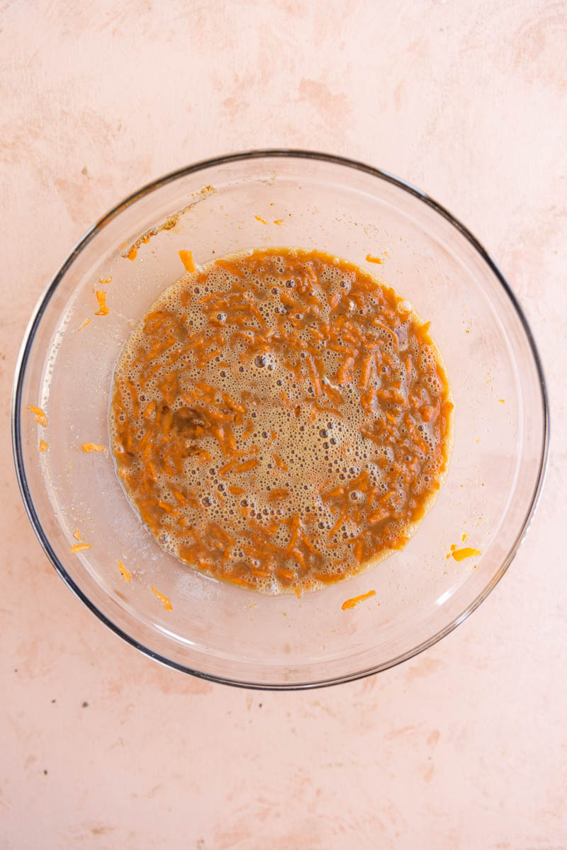 Wet ingredients in a glass mixing bowl.