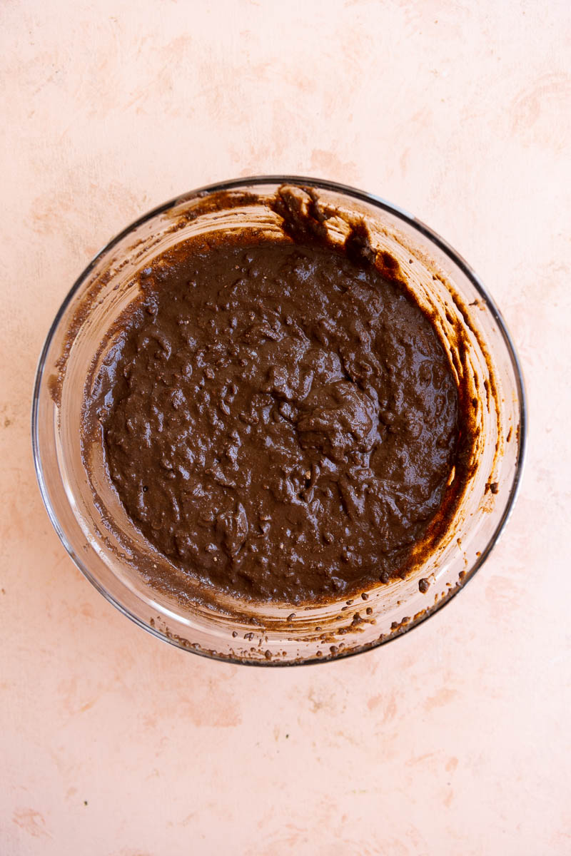 Chocolate carrot cake batter in a large bowl.
