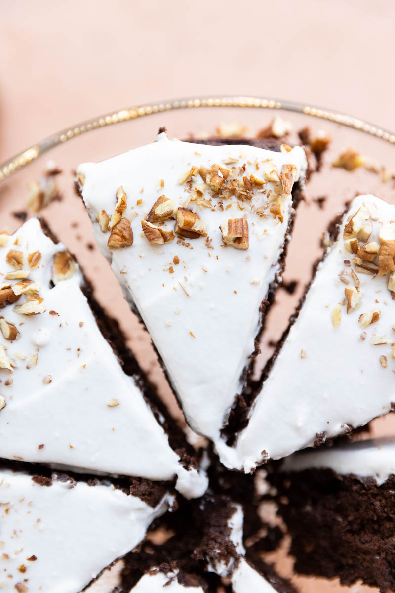 Overhead picture of chocolate carrot cake with coconut cream frosting.