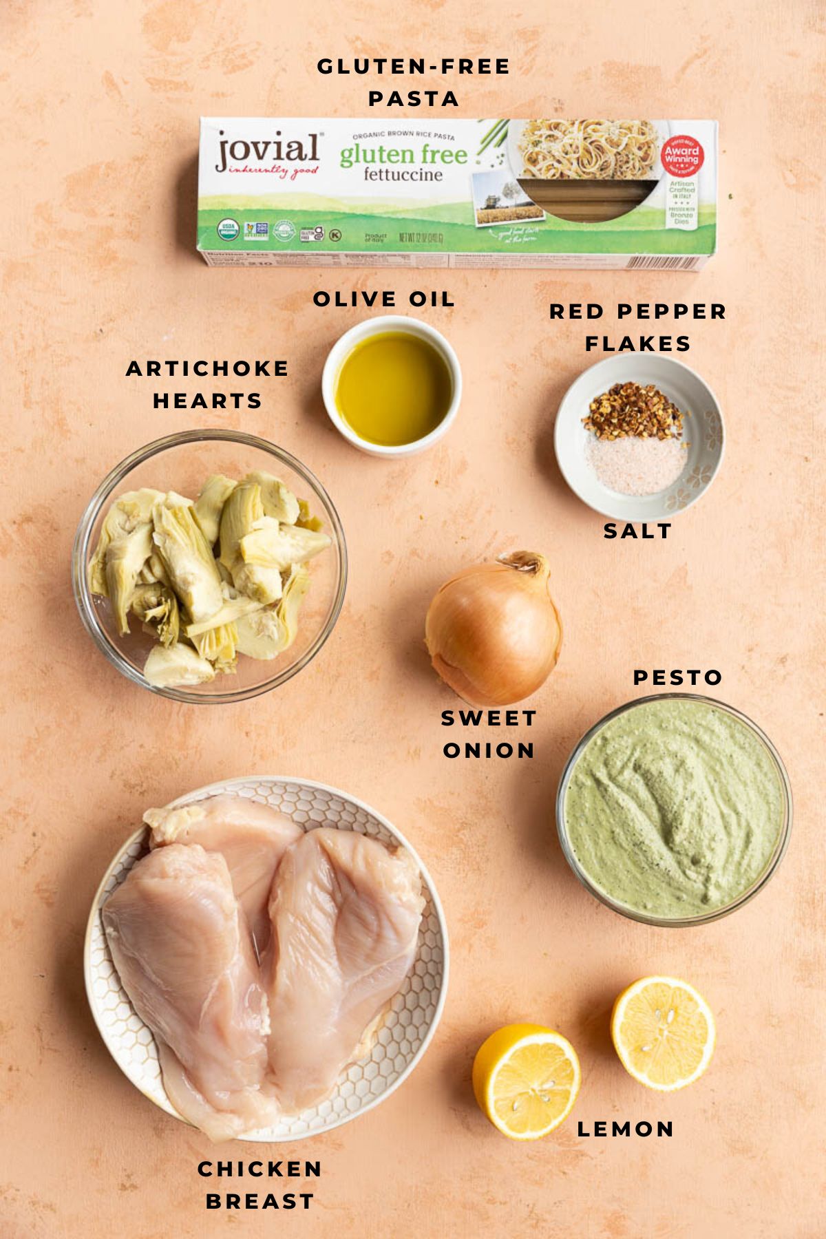 Ingredients measured out for artichoke pesto pasta dish.