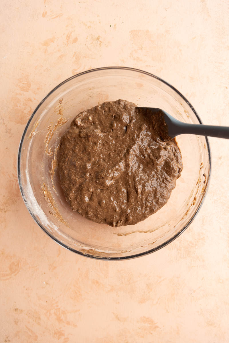 Gluten free chocolate pancake batter in a bowl.