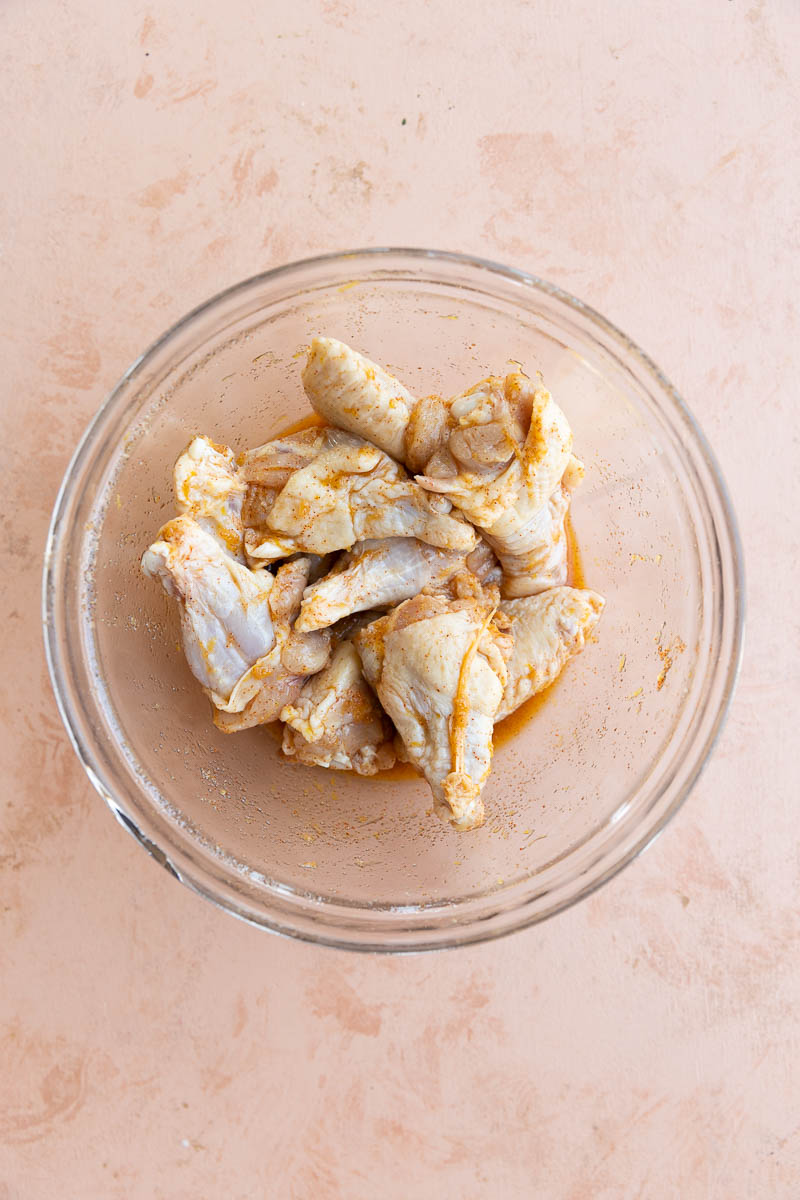 Chicken wings coated in the lemon honey pepper marinade.