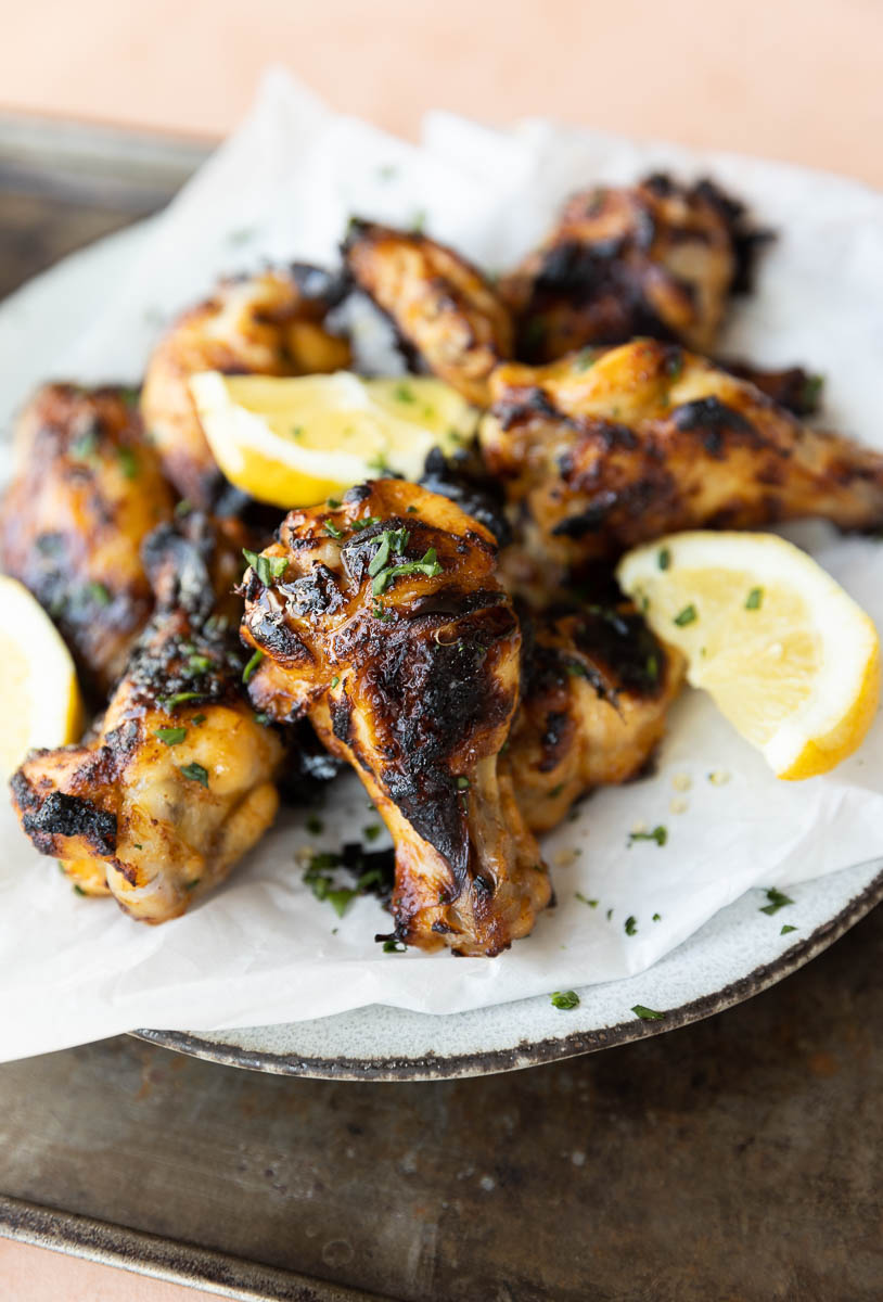Crispy chicken wings on a plate.