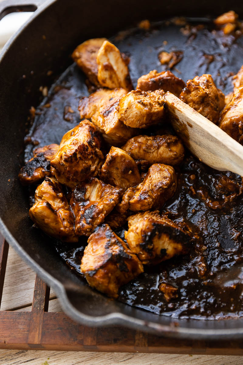 Cooked chicken with extra coating of sauce.