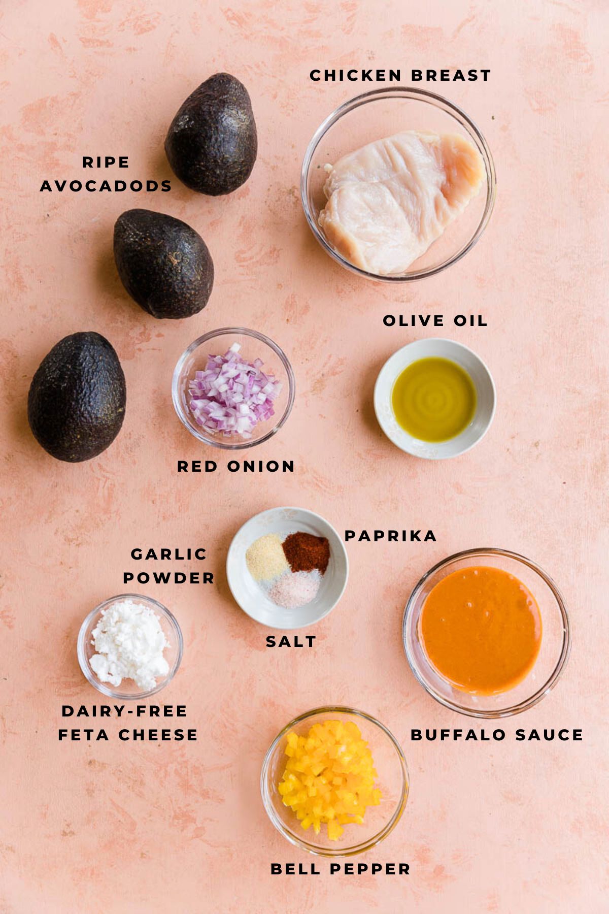 Ingredients measured out for buffalo chicken stuffed avocado.