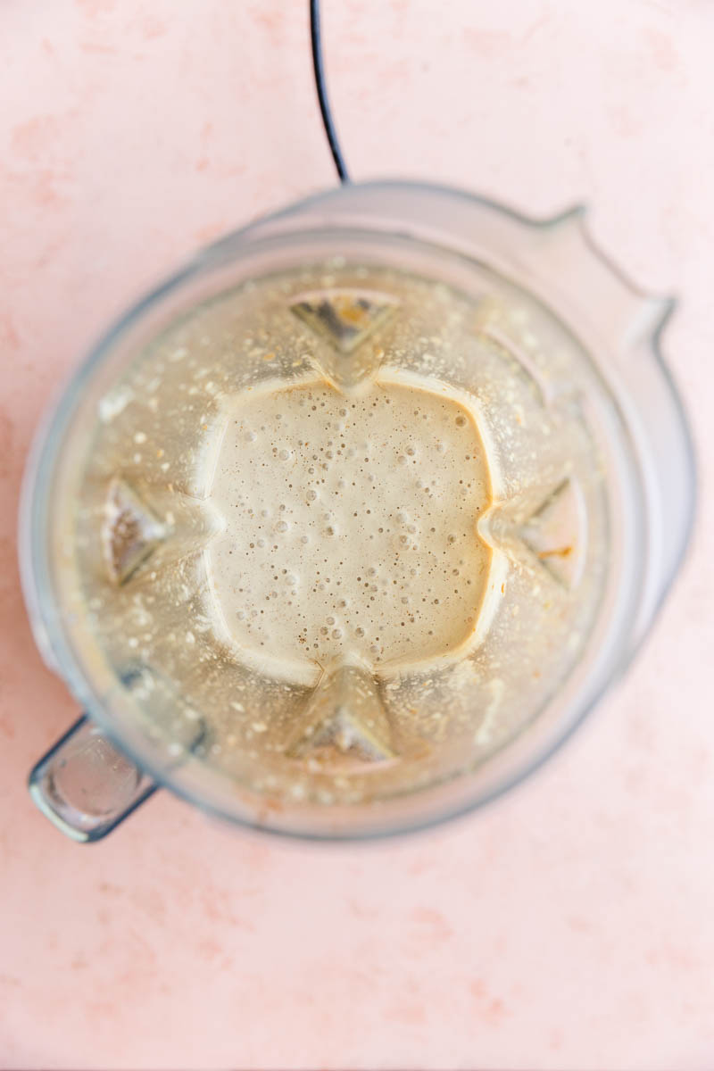 Creamy cinnamon smoothie in blender.