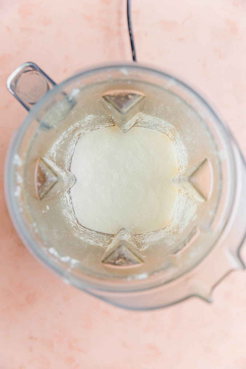 Blended lime sorbet mixture in vitamix.