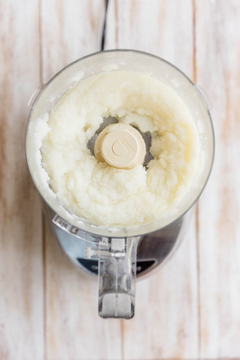 Creamy lime sorbet in food processor.