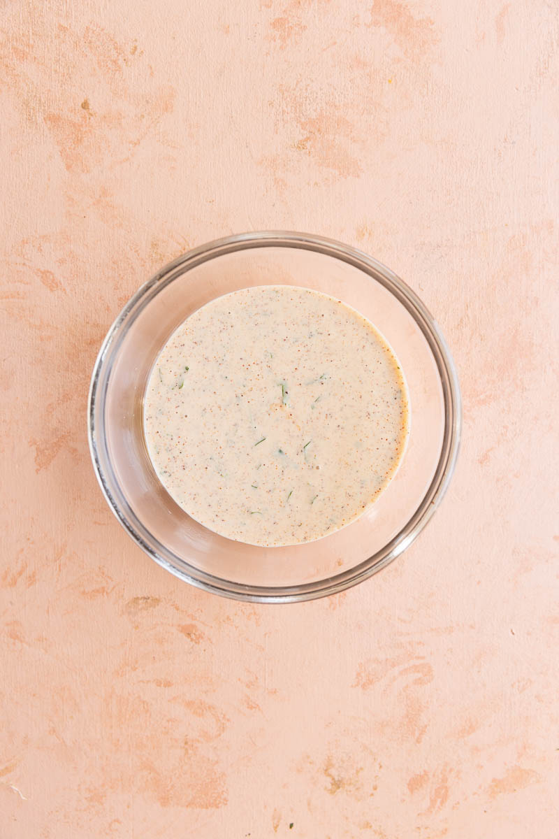 Creamy sauce blended in a glass bowl.