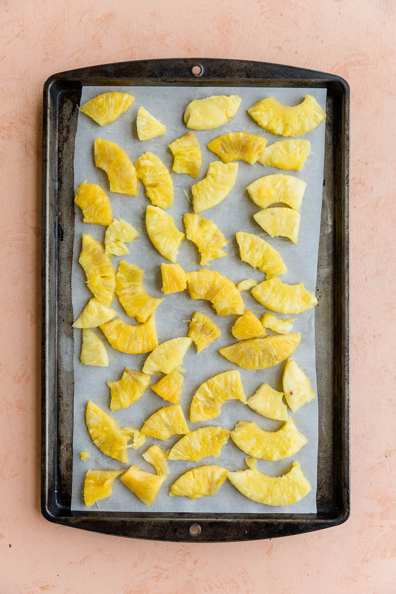 Fresh pineapple on a baking tray.