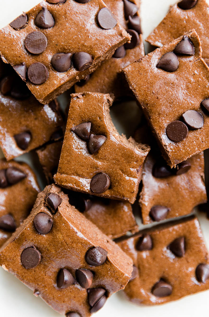 Chocolate protein bars layered on a plate.