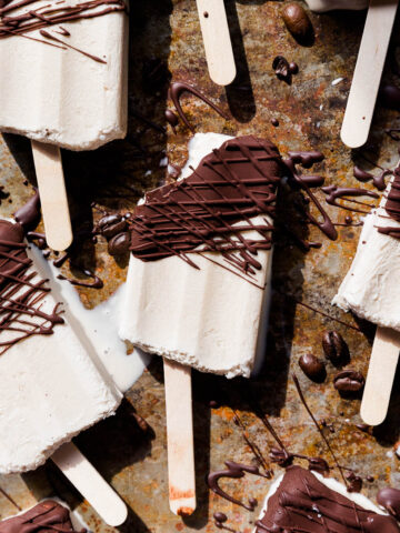 Coffee popsicles with chocolate on top.