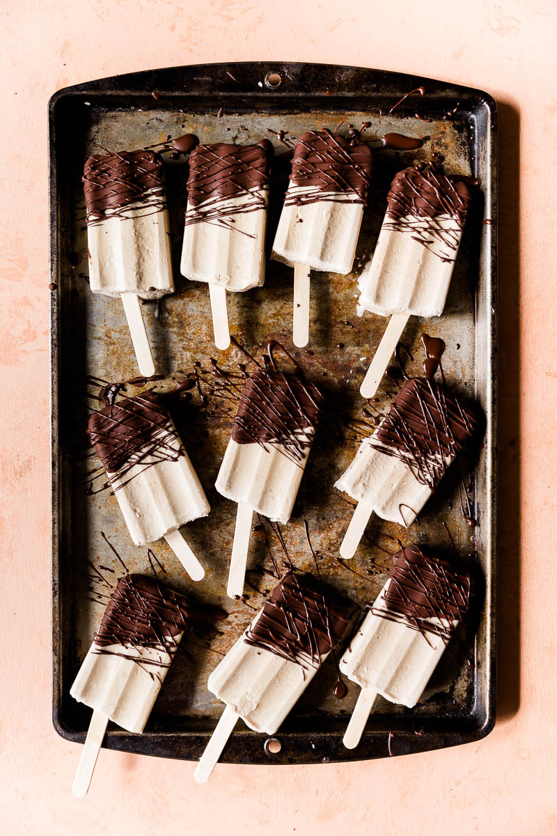 Finished popsicles on a tray.