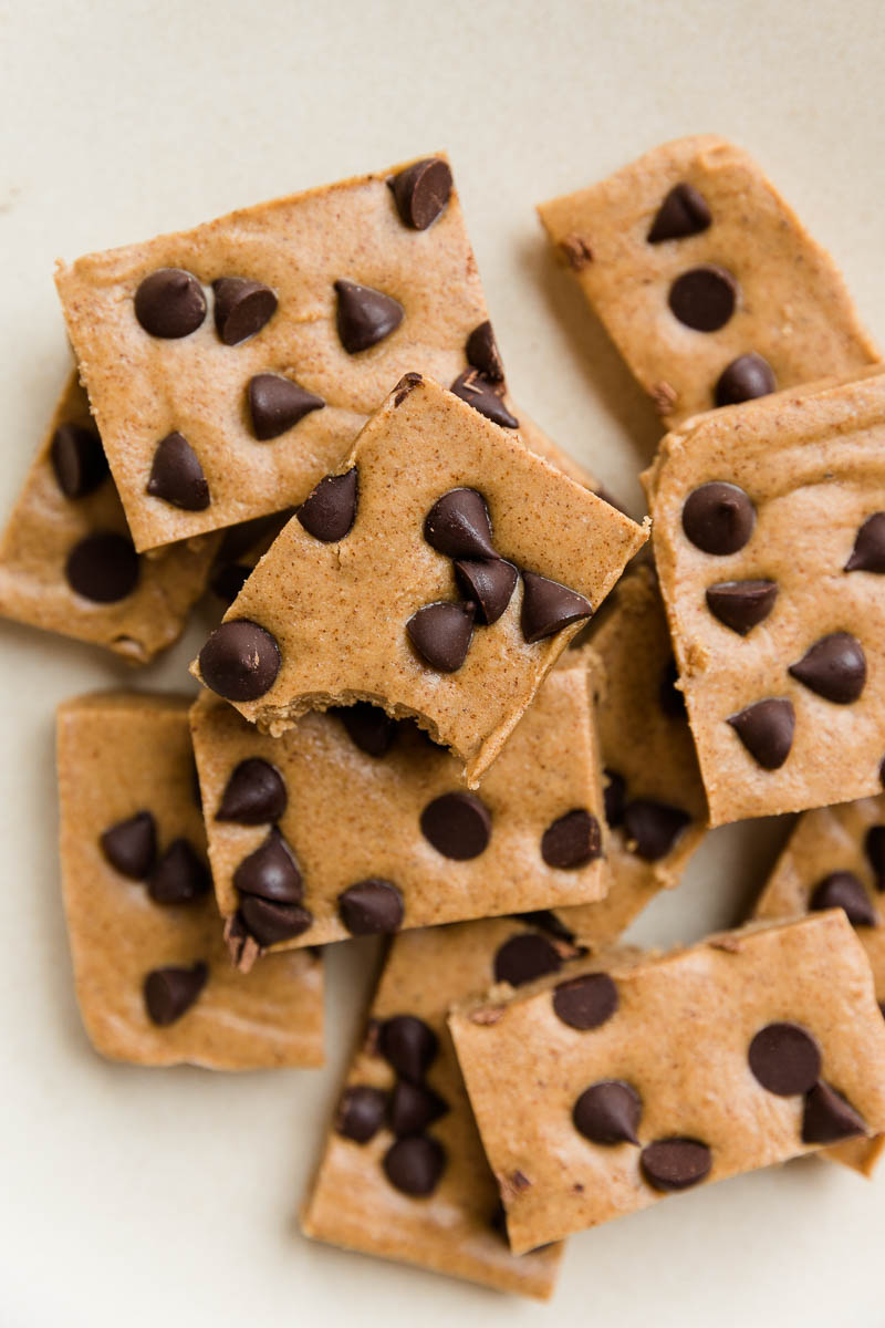 Cookie dough protein bars with chocolate chips on top.