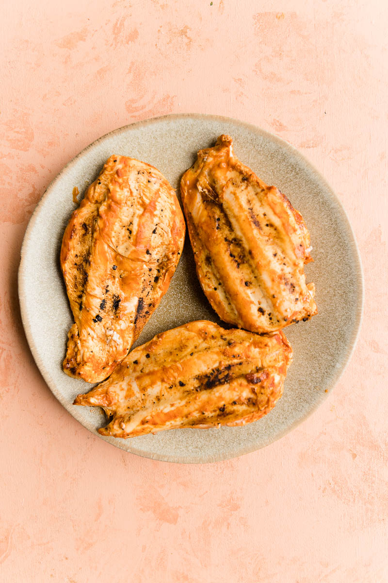 Grilled bbq chicken on a plate.