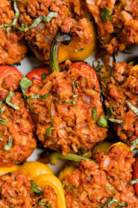 Close up picture of grilled stuffed peppers.