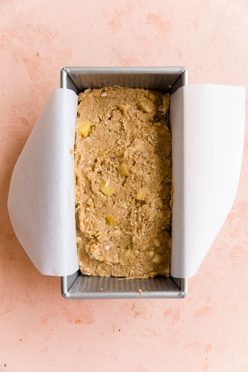 Pineapple banana bread in loaf pan.