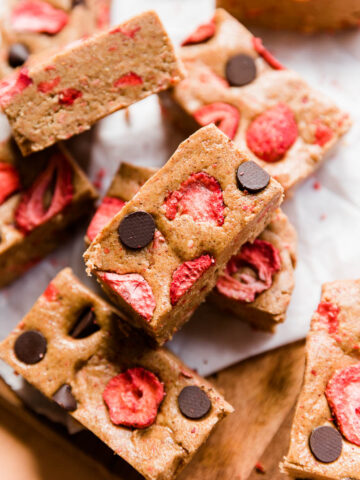 Strawberry protein bars with freeze dried strawberries on top.