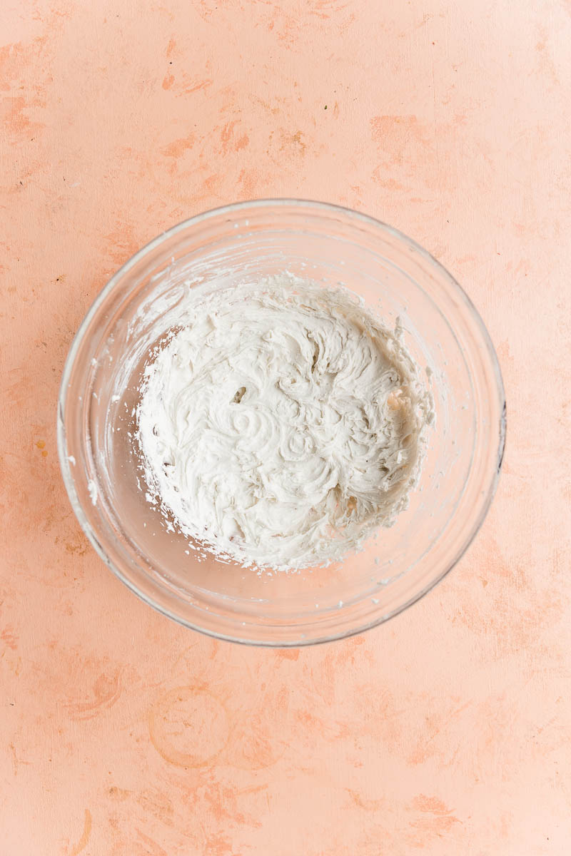 Homemade coconut whipped cream in a bowl.