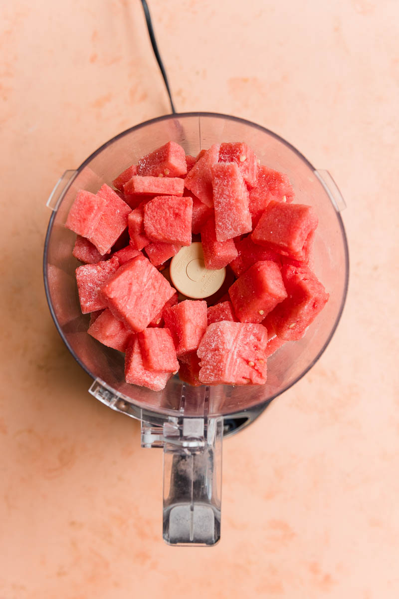 Frozen watermelon in a food processor.
