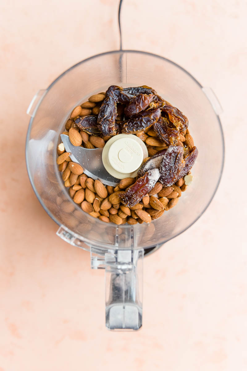 Dates, nuts, and salt in food processer.
