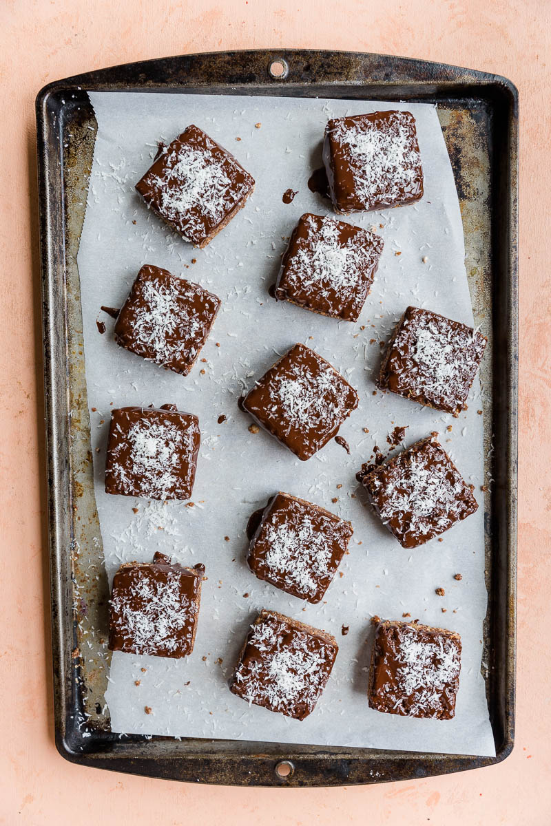 Chilled bars dipped in dark chocolate with shredded coconut on top.