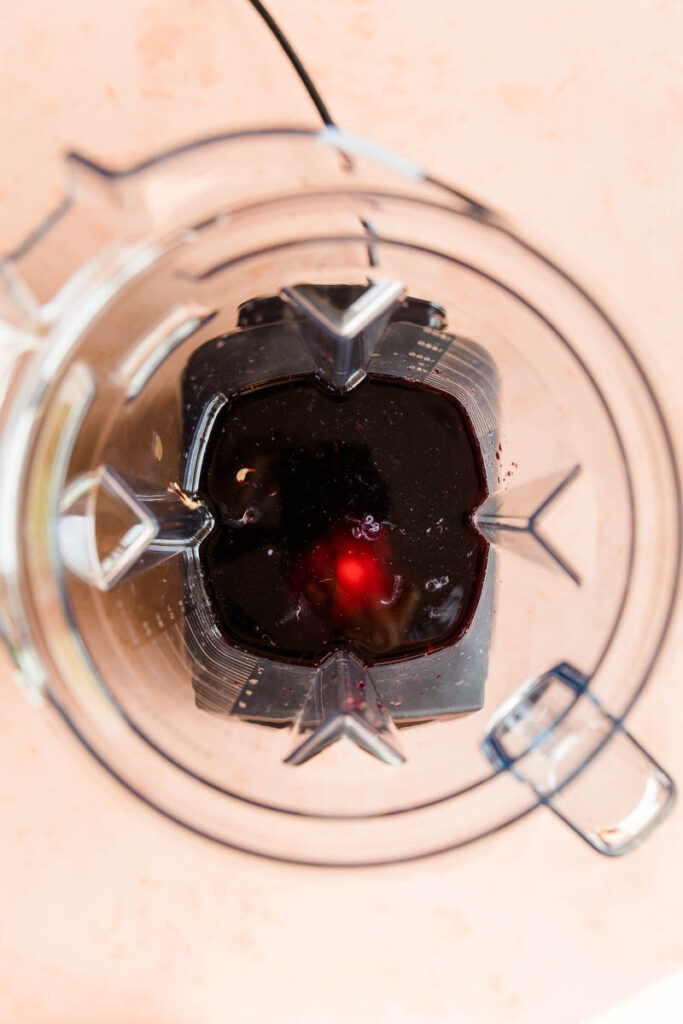 Cherry ice cream ingredients in blender.