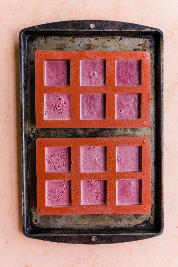 Frozen ice cream bars in silicone mold.