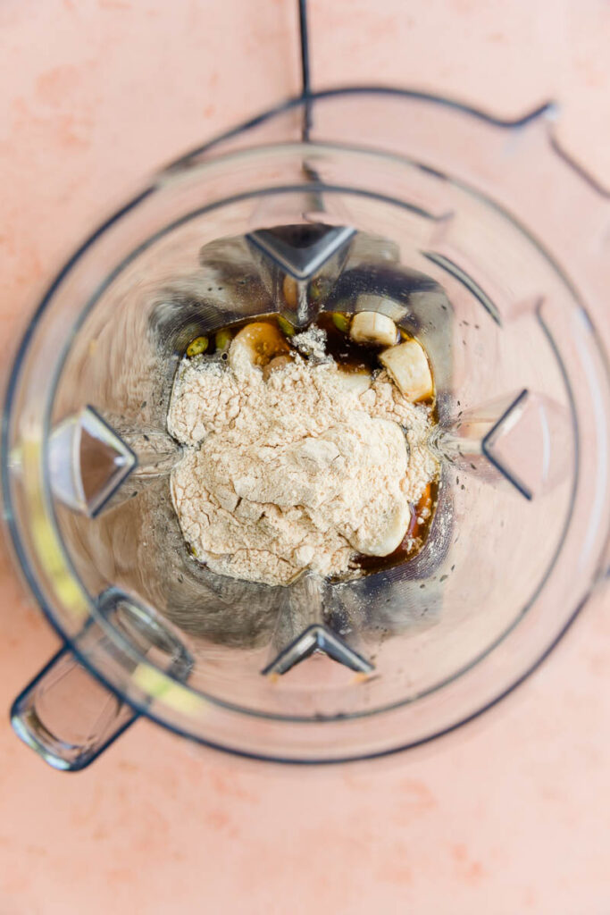 Ingredients for smoothie in blender.