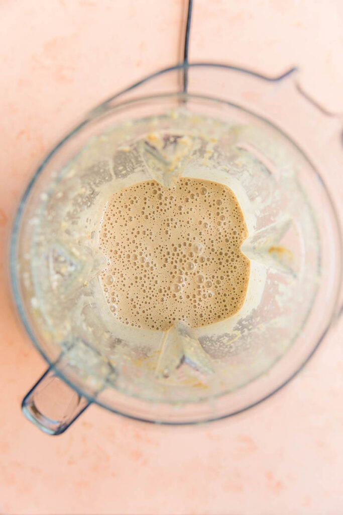Creamy smoothie in blender.