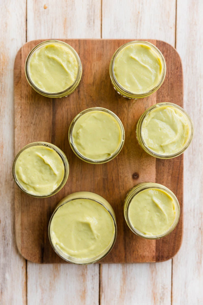 Creamy avocado pudding in small glass cups.