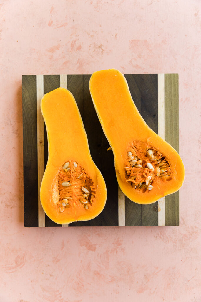Butternut squash cut in half.