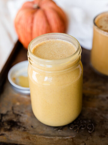 Pumpkin spice coffee creamer in mason jar.