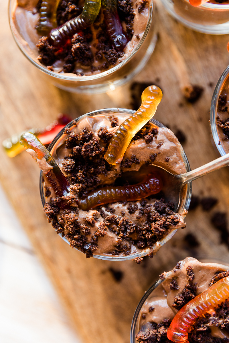 Halloween dirt cups with spoon stuck inside.