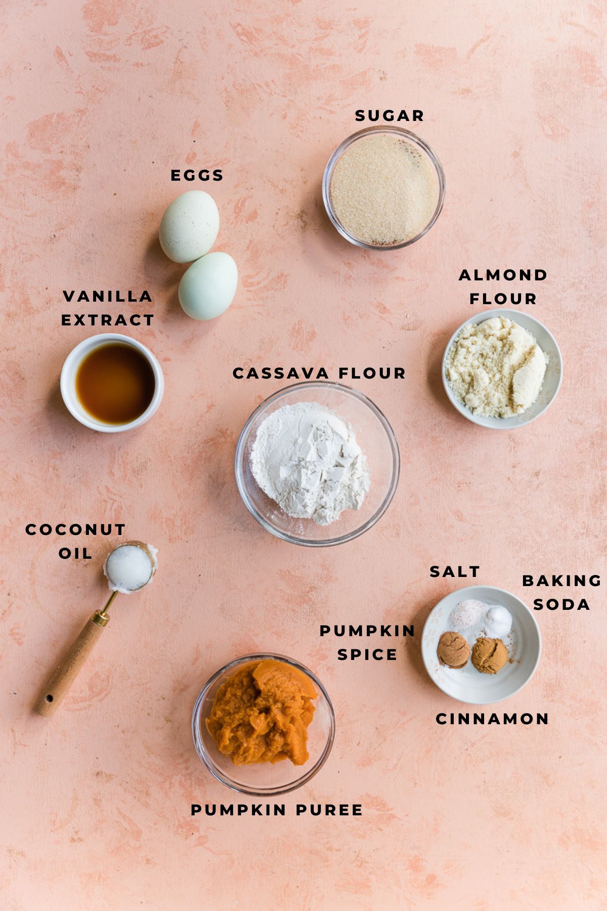 Ingredients measured out for pumpkin spice donuts.