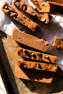 Pumpkin protein bars with chocolate chips on top.