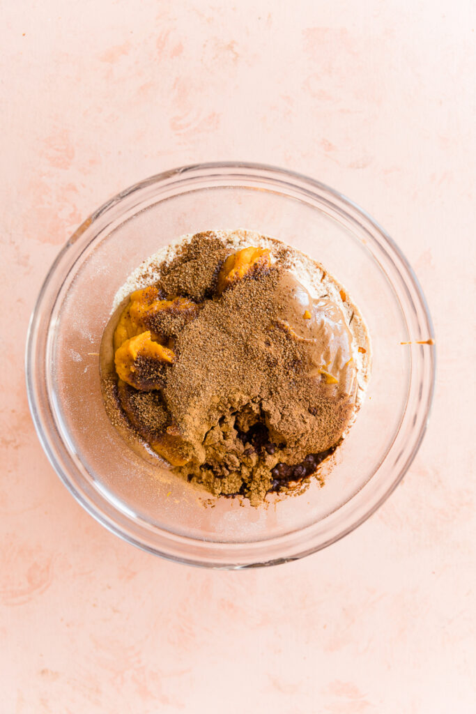 Pumpkin spice protein bar ingredients in a small bowl.