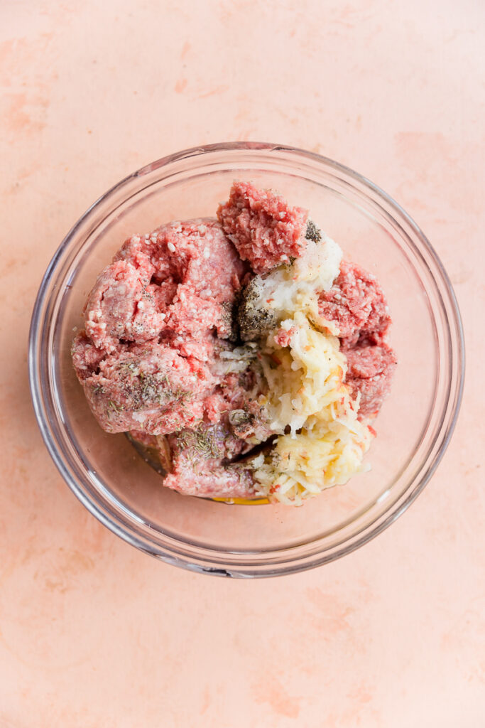 Meatball ingredients in bowl.