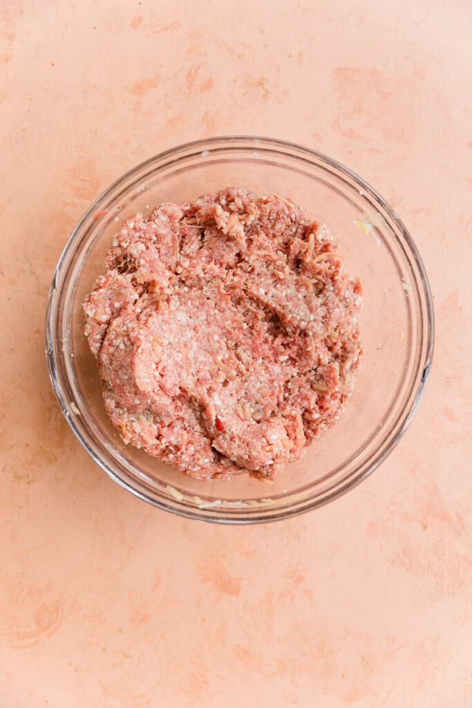 Meatball mixture in mixing bowl.