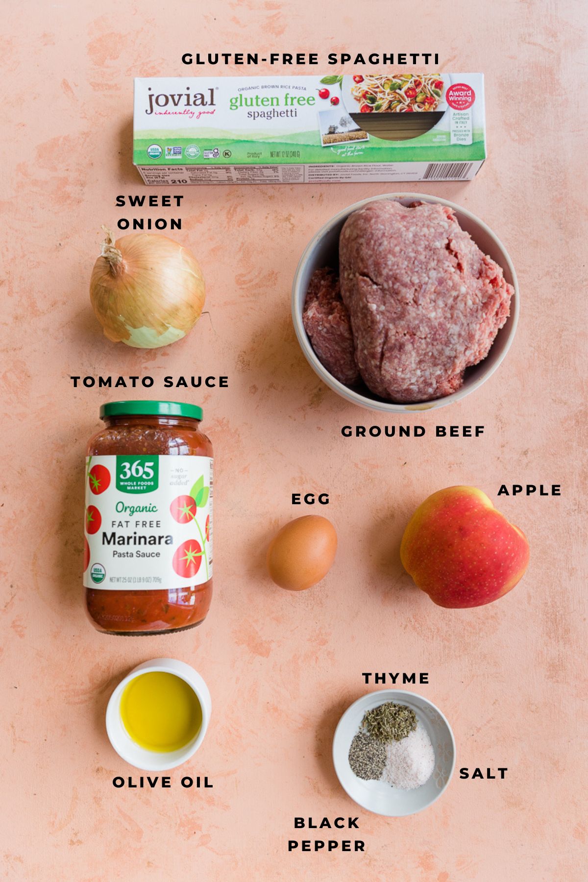 Ingredients for zombie eye meatballs with sauce and spaghetti.