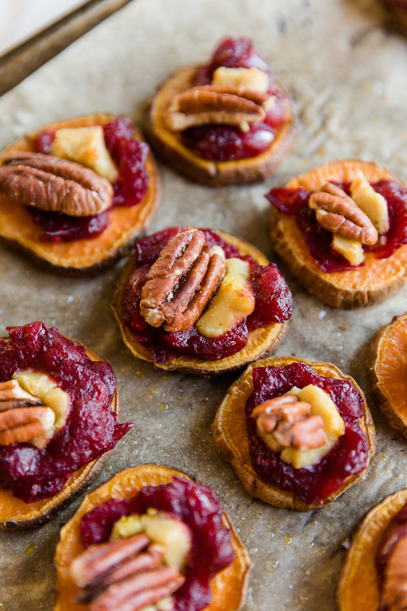 Sweet Potato Bites with pecans on top.