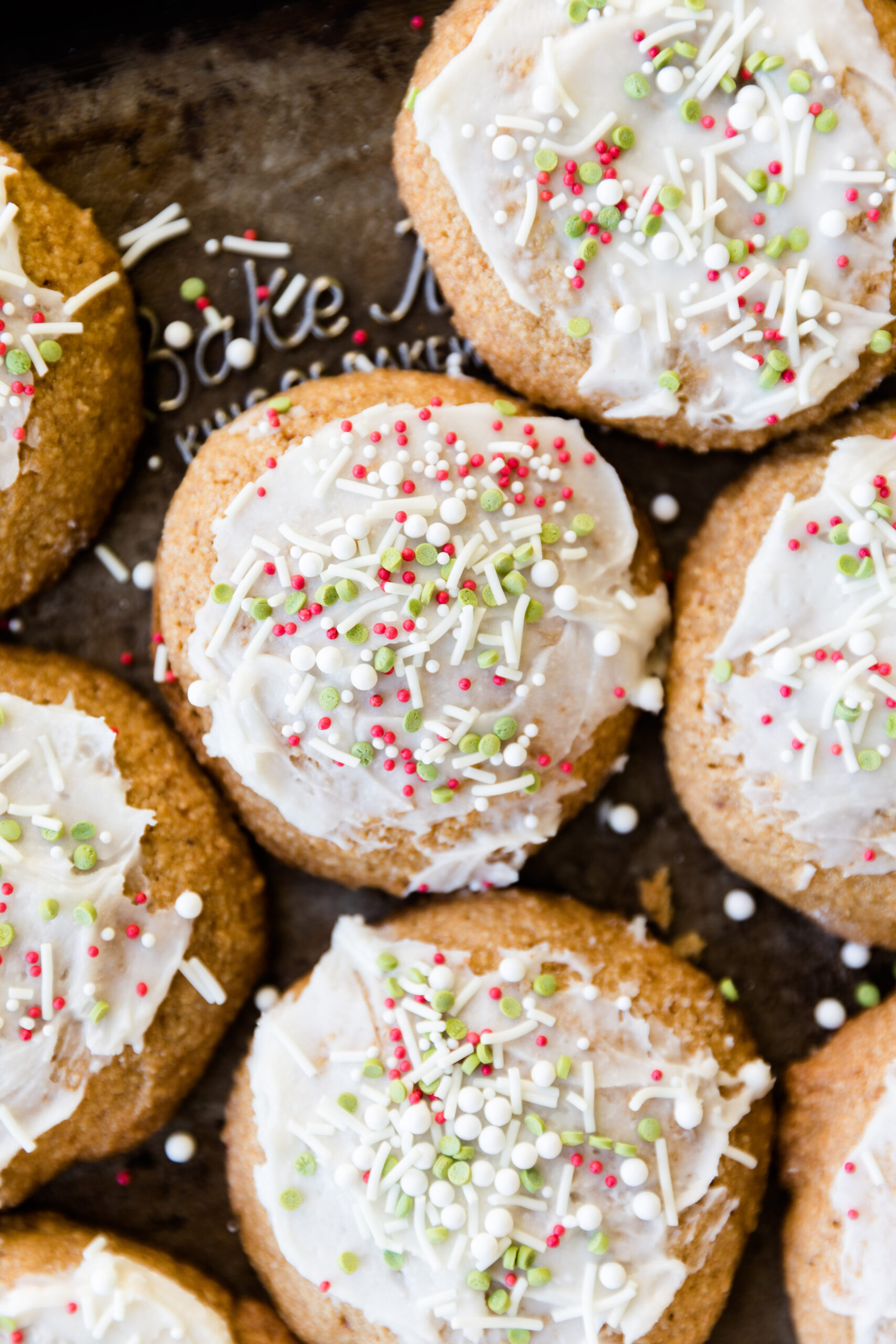Overhead picture of soft sugar cookies with Christmas sprinkles.