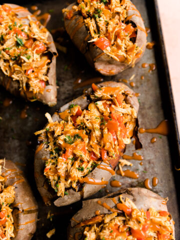 Overhead picture of buffalo chicken baked potatoes.