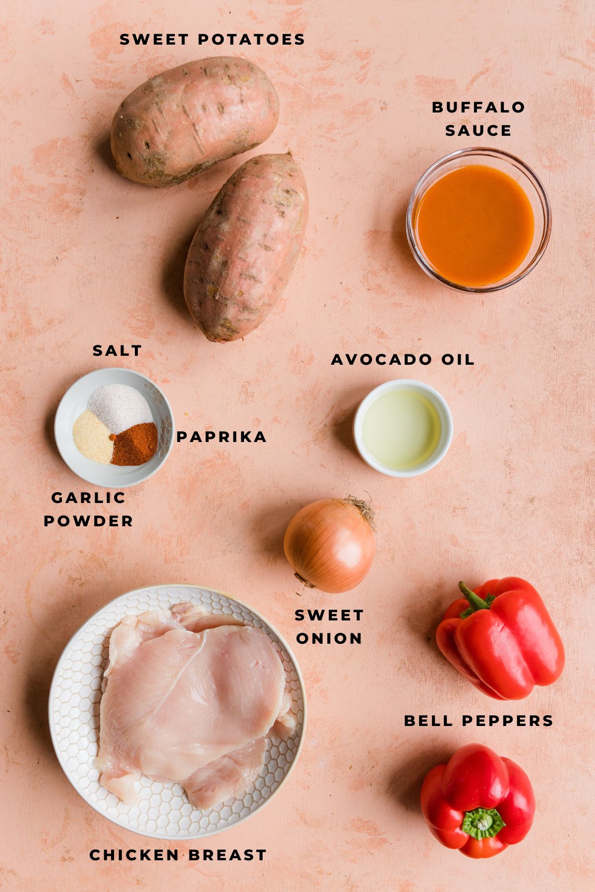 Ingredients measured out for buffalo chicken stuffed sweet potatoes.