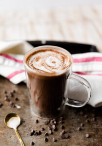Hot chocolate in glass mug.