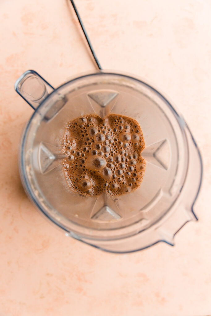 Creamy hot chocolate in high speed blender.